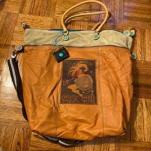 Art inspired leather bag with zipper details